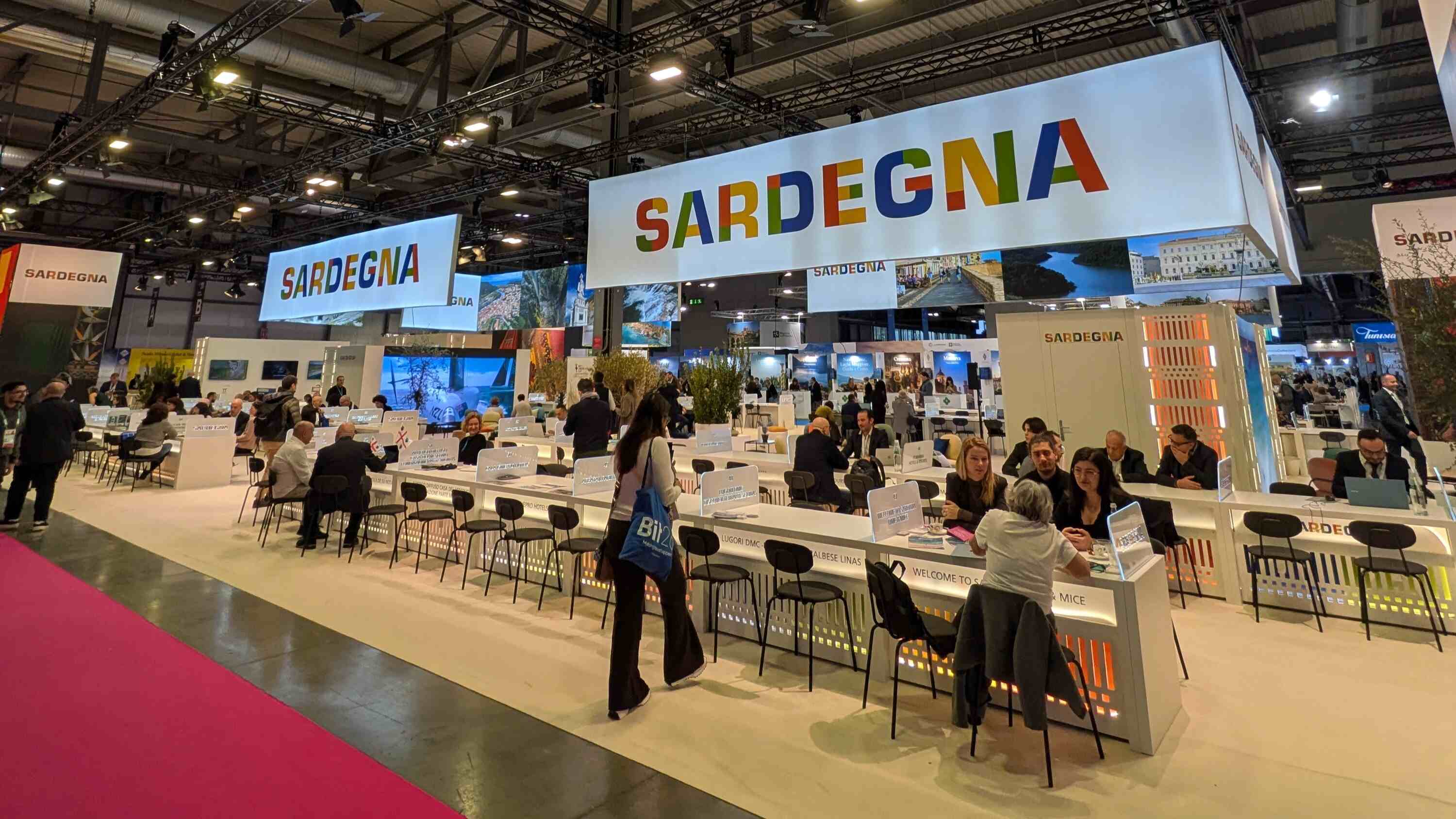 BIT Milan travel exhibition floor showing international country pavilions and buyer meeting zones
